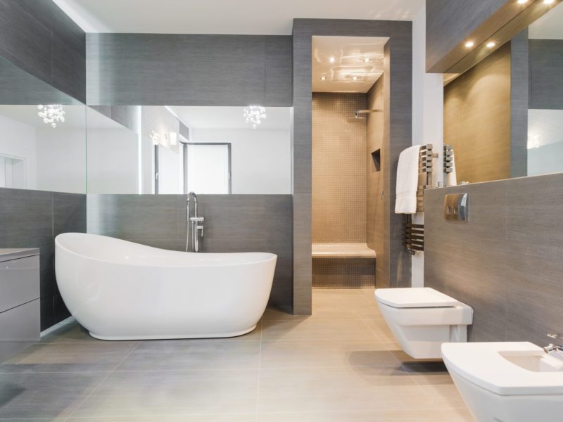Designed freestanding bath in gray modern bathroom